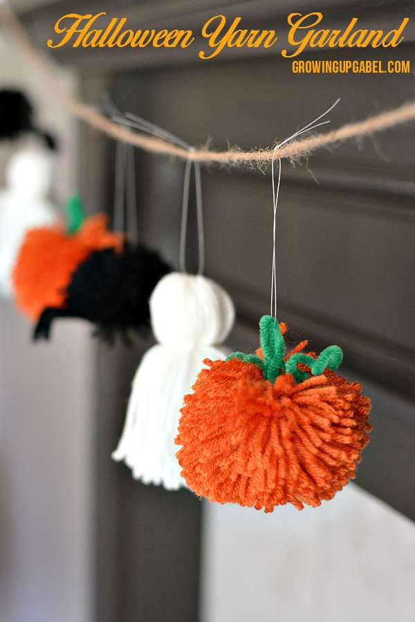 Decorate your mantle or home for Halloween with this easy Halloween garland! Made from yarn and few other simple craft supplies, this fun decoration is perfect for kids!