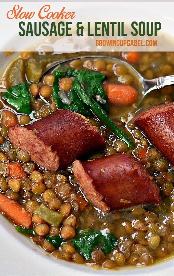 Sausage and lentil soup is cooked in Crock Pot slow cooker until the lentils are tender in this delicious comfort food. Baby spinach and carrots are added for a healthy one pot meal. 