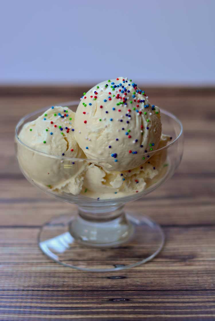 Want to make ice cream but don't have fancy ice cream maker? This easy 3 ingredient ice cream recipe only requires a whisk to make the creamiest homemade ice cream you've ever had!