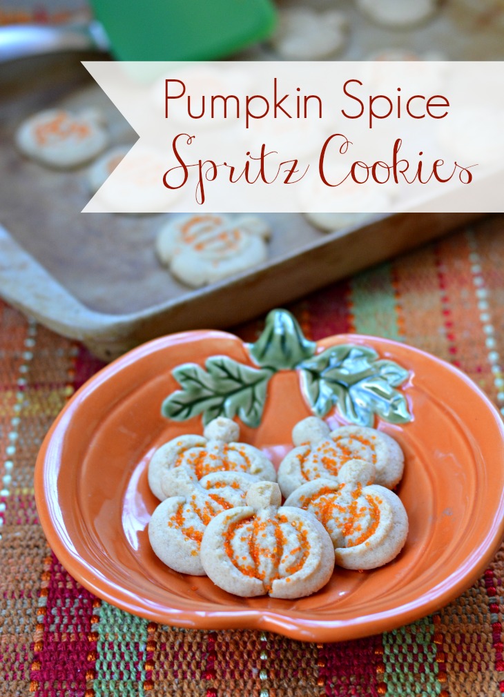 Pumpkin spice spritz cookie recipe is a simple butter cookie with pumpkin spice! Use a cookie press to make these easy cookies for fall!