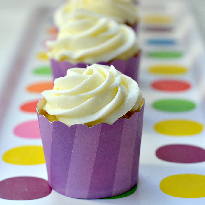 Looking for a unique dessert for Easter or Mother's Day? Turn plain vanilla in to lavender cupcakes with essential oils. The orange frosting pairs perfectly with this uniquely flavored cupcake recipe.