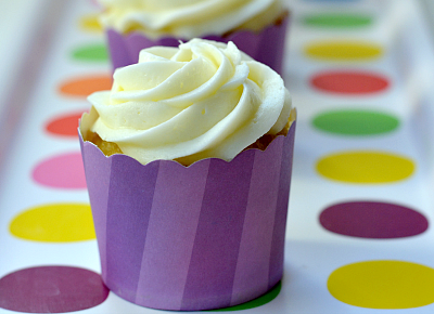 Looking for a unique dessert for Easter or Mother's Day? Turn plain vanilla in to lavender cupcakes with essential oils. The orange frosting pairs perfectly with this uniquely flavored cupcake recipe.