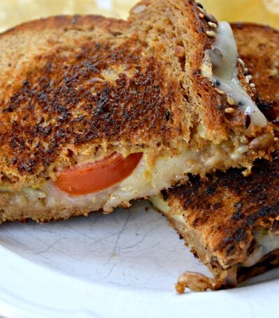 The best grilled cheese sandwich recipe ever! Havarti cheese is melted between slices of whole grain bread with tomatoes and Dijon mustard for the Ultimate Grilled Cheese Sandwich!