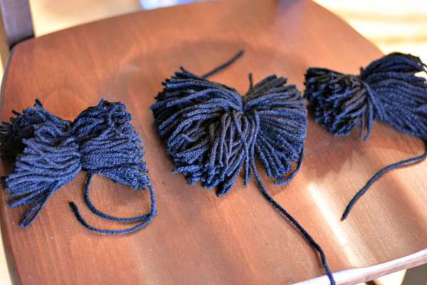 Black yarn in 3 bundles