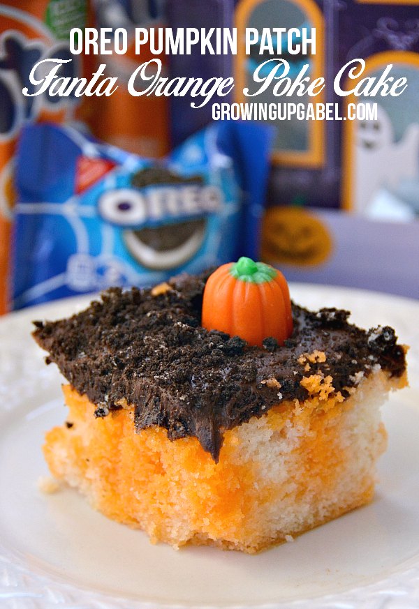 Turn a poke cake in to a fun pumpkin patch this Halloween! No one will guess a festive orange cake lays beneath the "dirt" layer of chocolate frosting and OREO cookies!