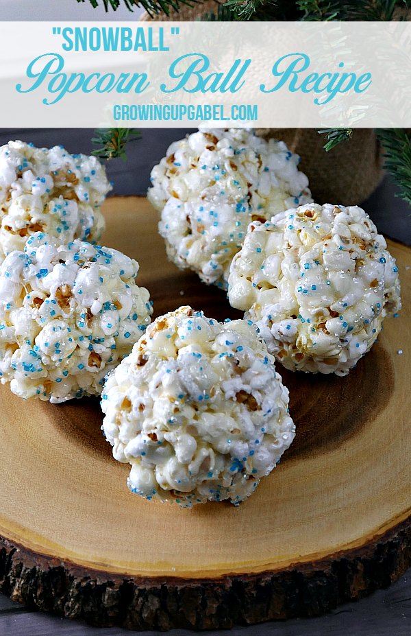 Bring the cold inside and make snowballs with an easy marshmallow popcorn ball recipe! A few simple ingredients and about 15 minutes are all you need to make a fun winter treat everyone will love.