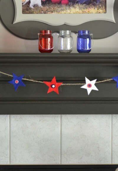 Thread felt stars through twine for an easy DIY star garland. Perfect for the Fourth of July decorations or all summer long!