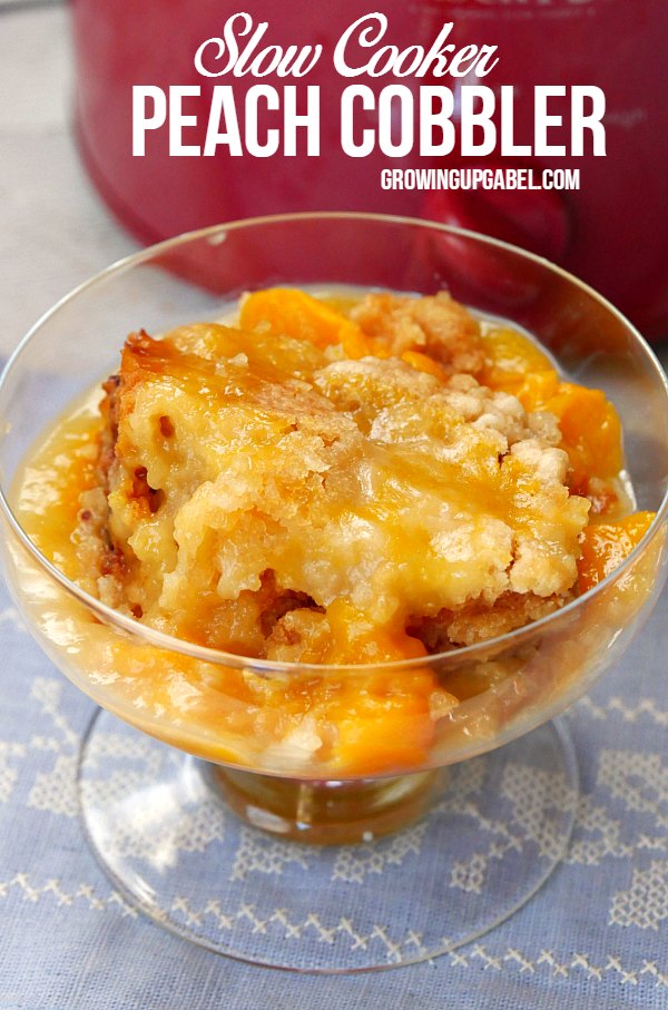 Make an easy Crock Pot peach cobbler with cake mix and just two more ingredients - canned peaches and butter! Layer all the ingredients in the Crock Pot and cook for a few hours to make a delicious dump cake like dessert. 