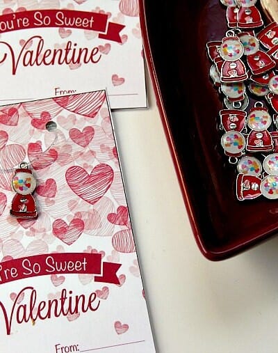 Handmade kids valentines cards include a handmade necklace.