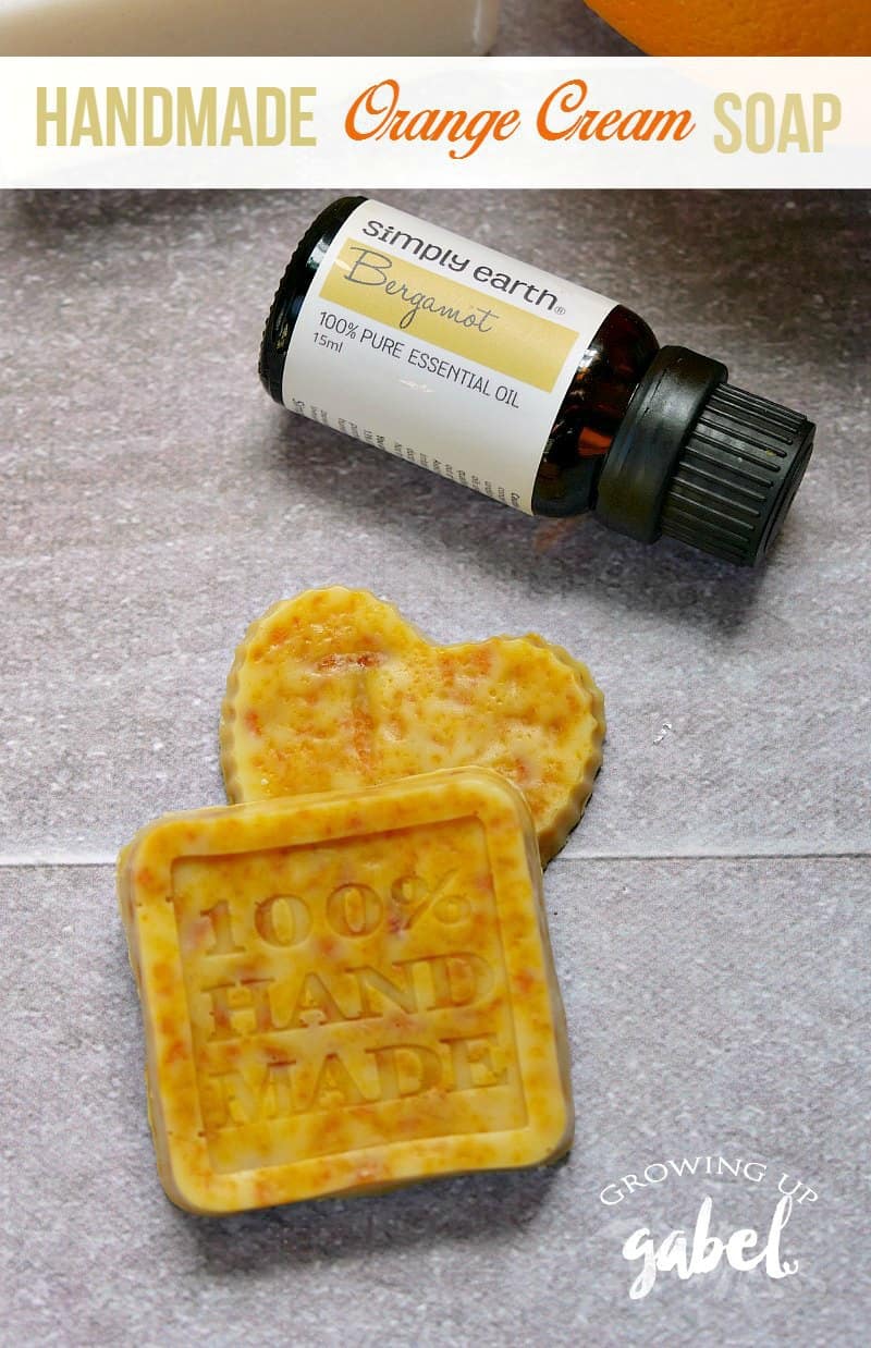 Use essential oils to make a homemade orange scented soap! Add bergamot oil and fresh orange peel to soap base with this easy recipe for a sweet smelling handmade orange soap.