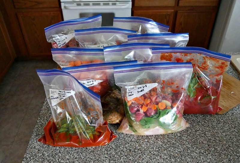 bags of freezer meals on a kitchen counter