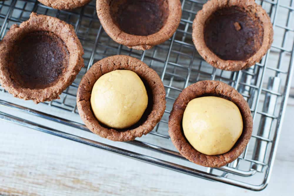 Cookie cups with peanut butter filling balls