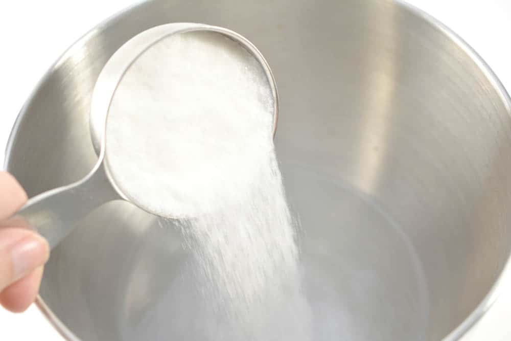 Sugar poured into a mixing bowl