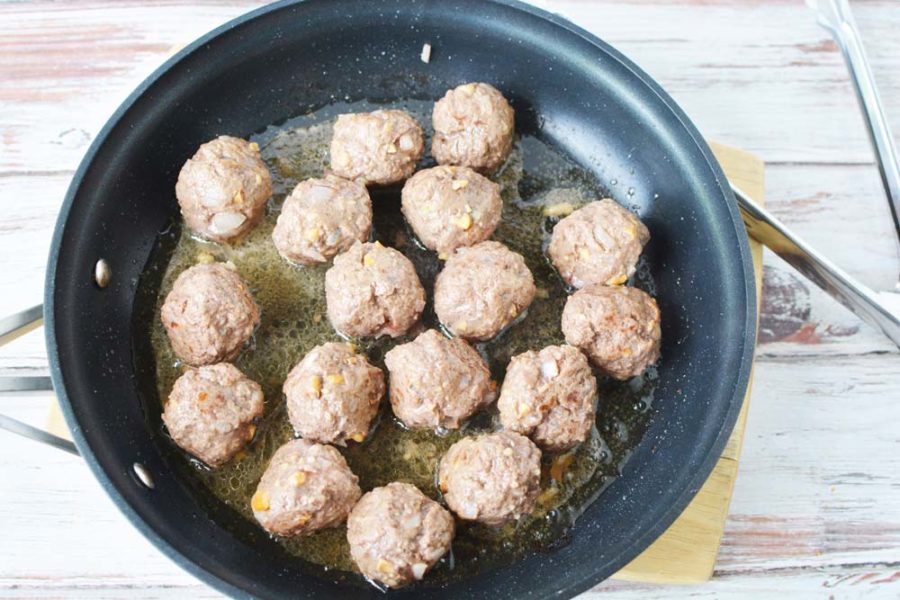 Cooked meatballs in frying pan