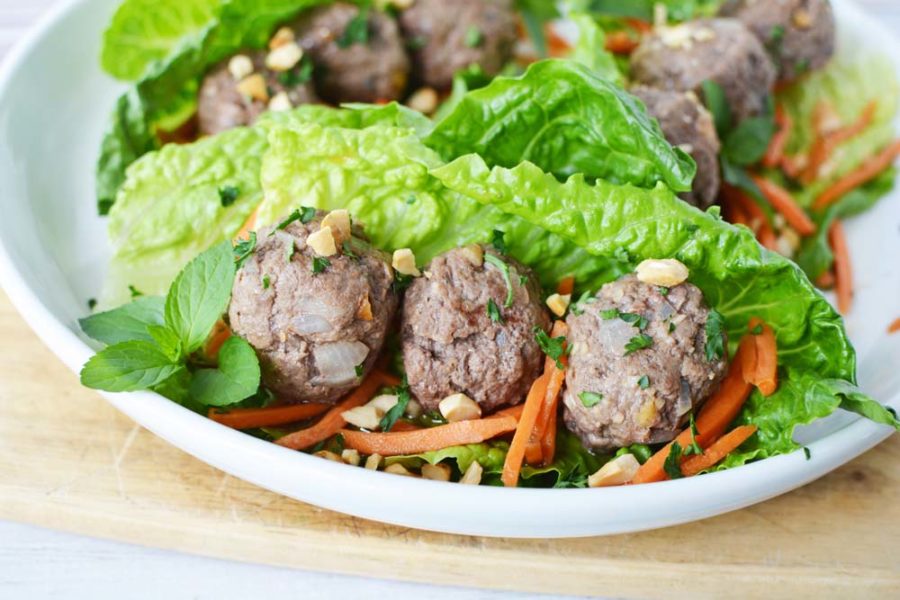 Vietnamese meatballs on a plate in lettuce