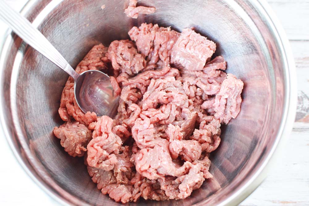 Ground beef in a mixing bowl