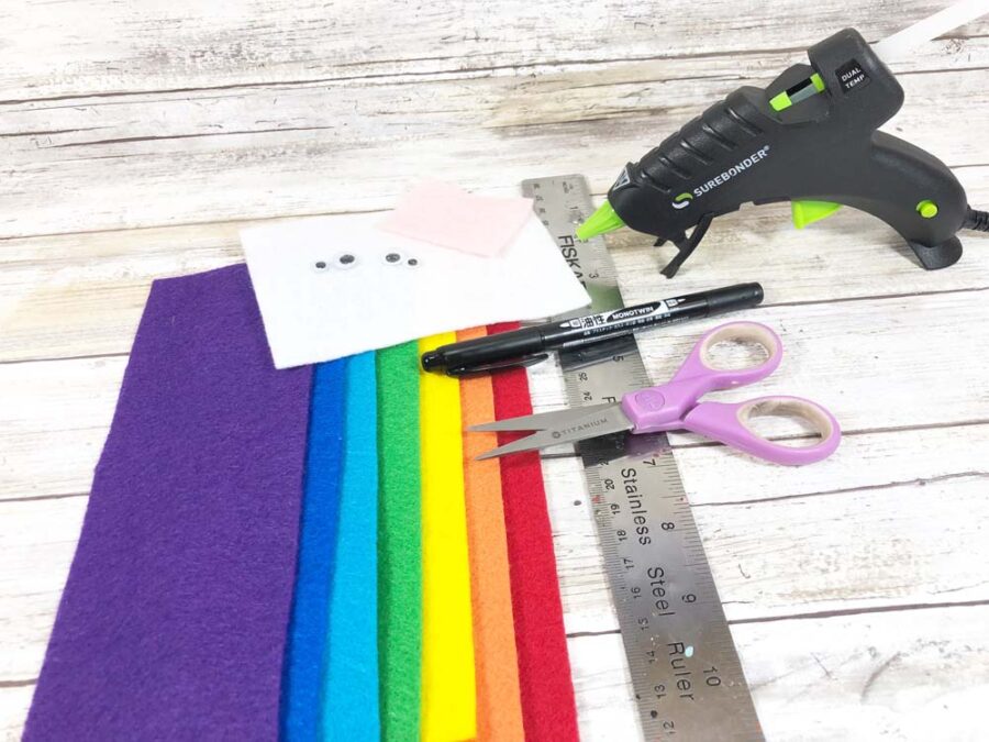 Craft supplies to make a Rainbow bookmark 