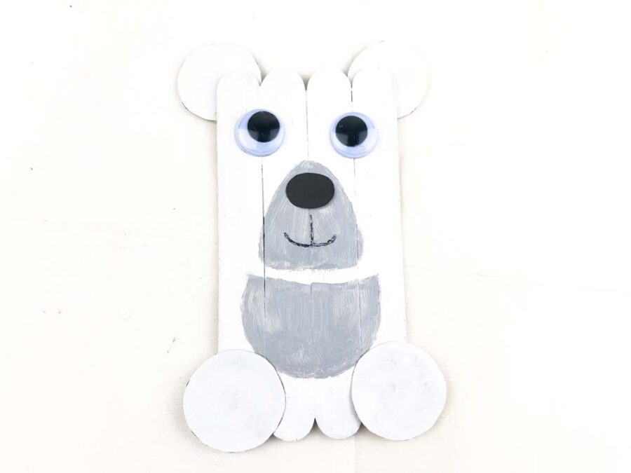 Polar bear popsicle stick craft with circle glued on