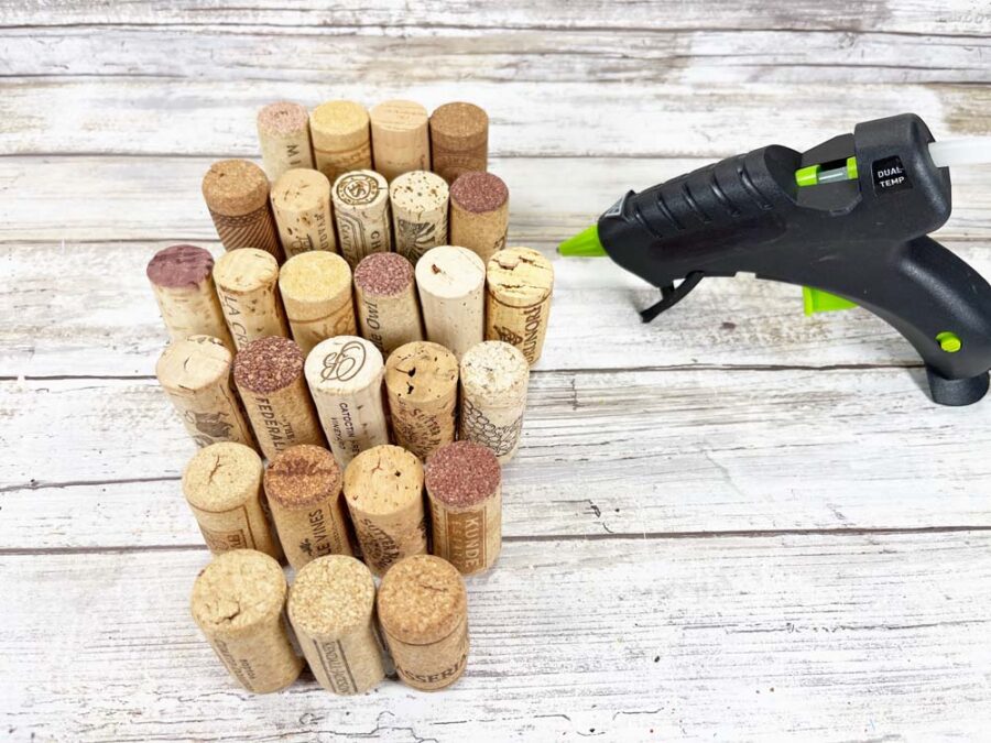 wine corks in rows with glue gun