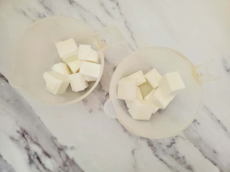 Cut up soap base in measuring cups
