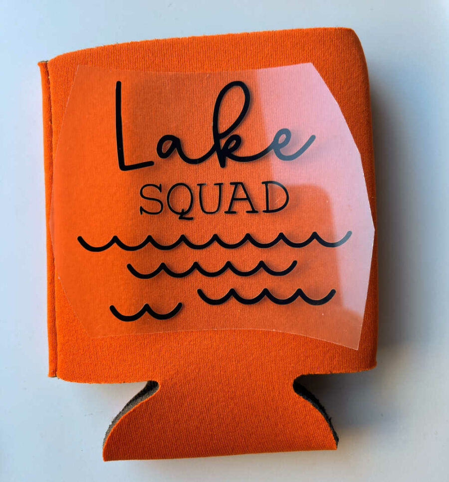 Lake Squad iron on on an orange can koozie