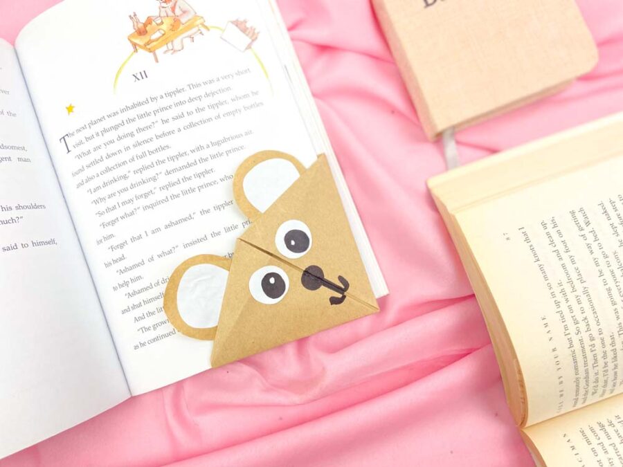 Origami bear corner bookmark on a book