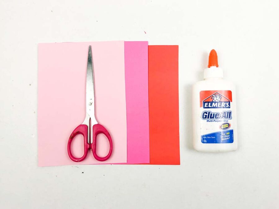 Scissors, colored paper and glue