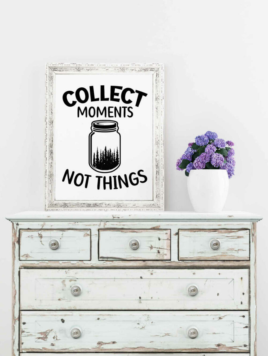 Collect moments not things SVG poster on a dresser