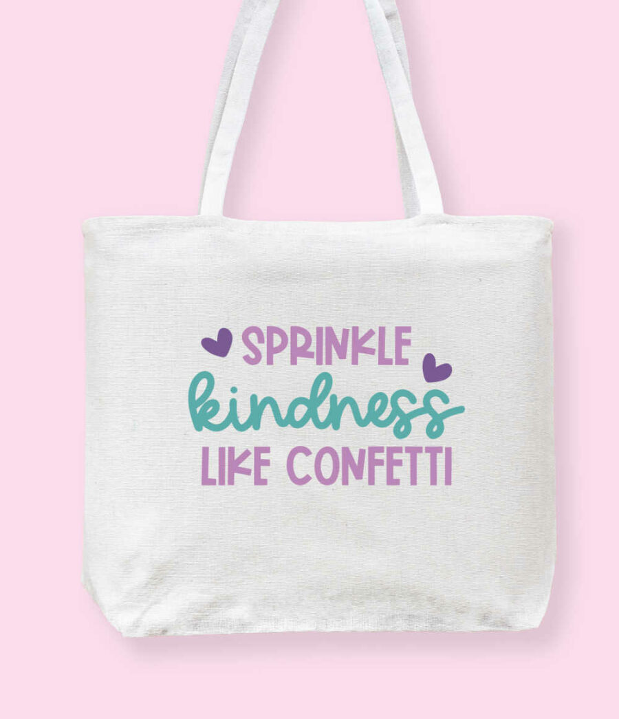 Sprinkle kindness like confetti sublimation on a tote bag