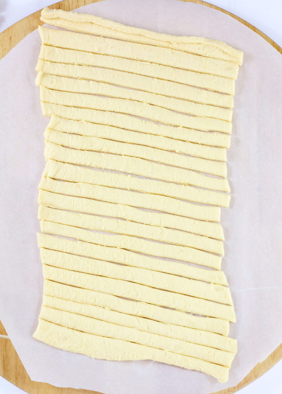 Crescent dough sheet cut into strips