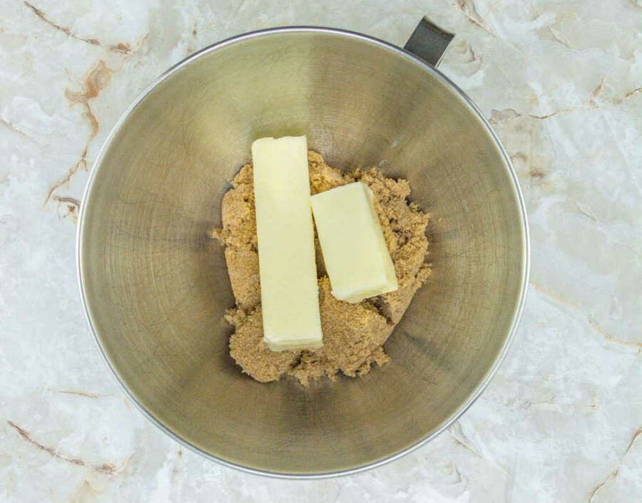 Brown sugar and butter in a mixing bowl