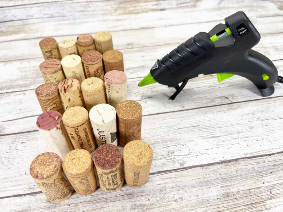 Wine corks set out in 5 rows of 4 with a glue gun