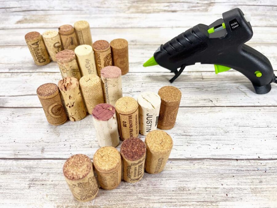 Wine corks in rows with a glue gun