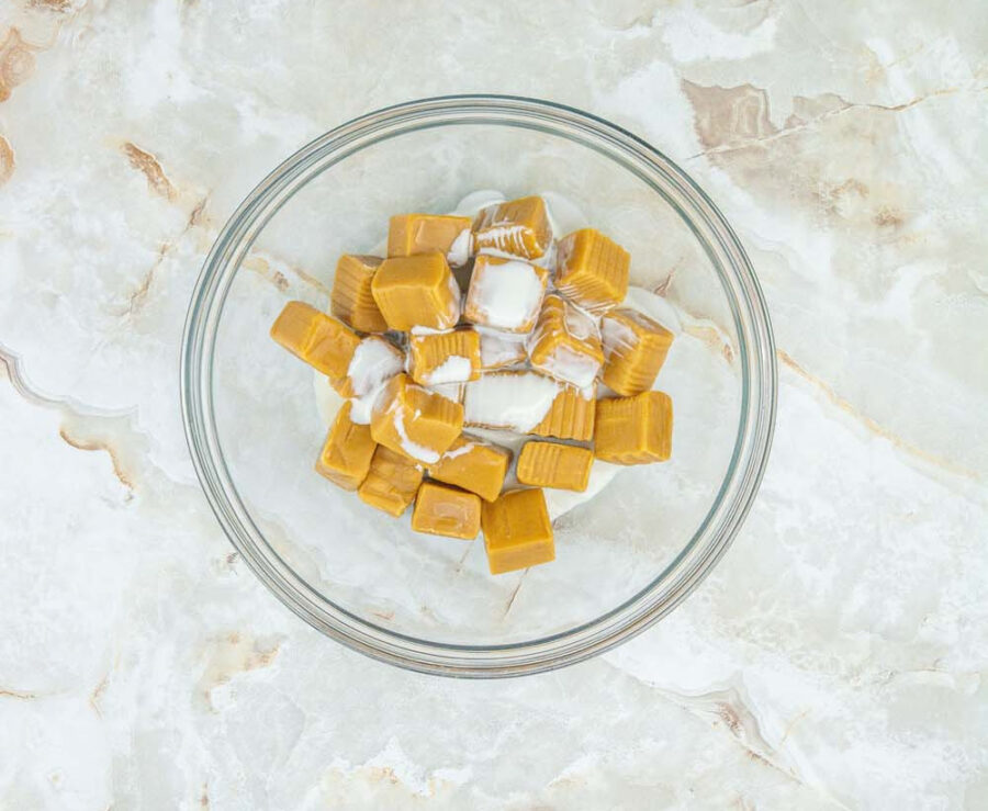 Caramels and cream in a glass bowl